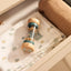 On The Go ▪ Houten Regenrammelaar