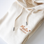 Uniseks hoodie eigen ontwerp - met borduring